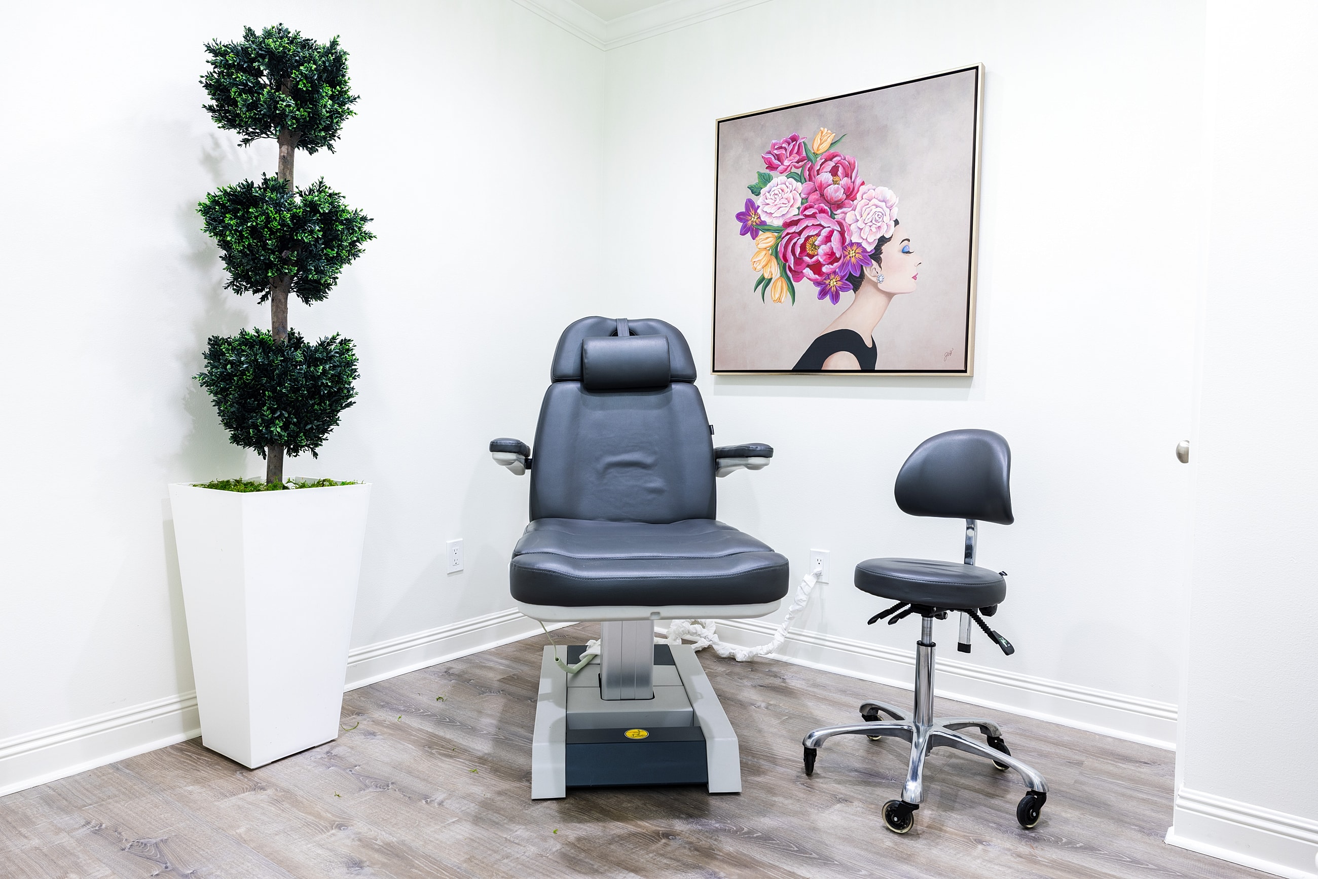 Woman adjusting black high heel shoe.