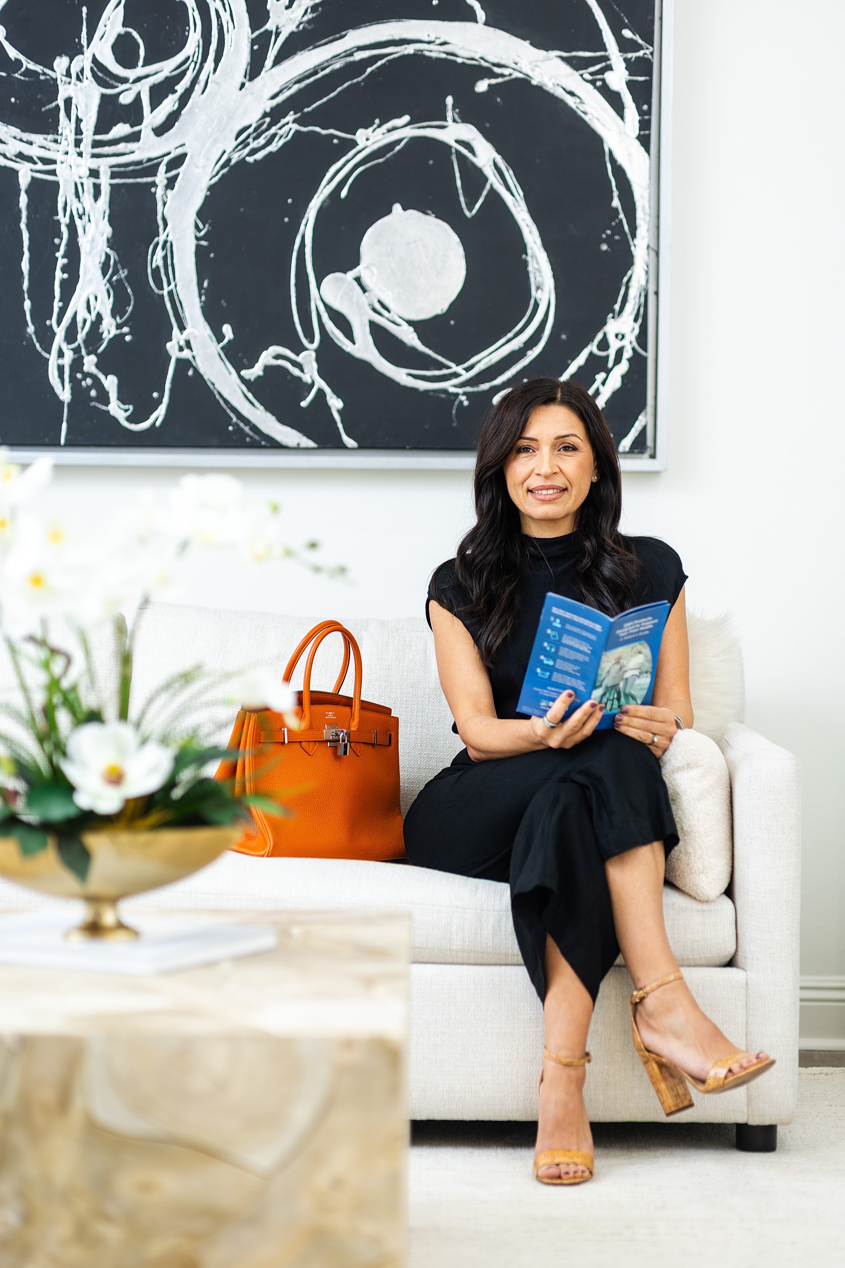City skyline at night with illuminated buildings.