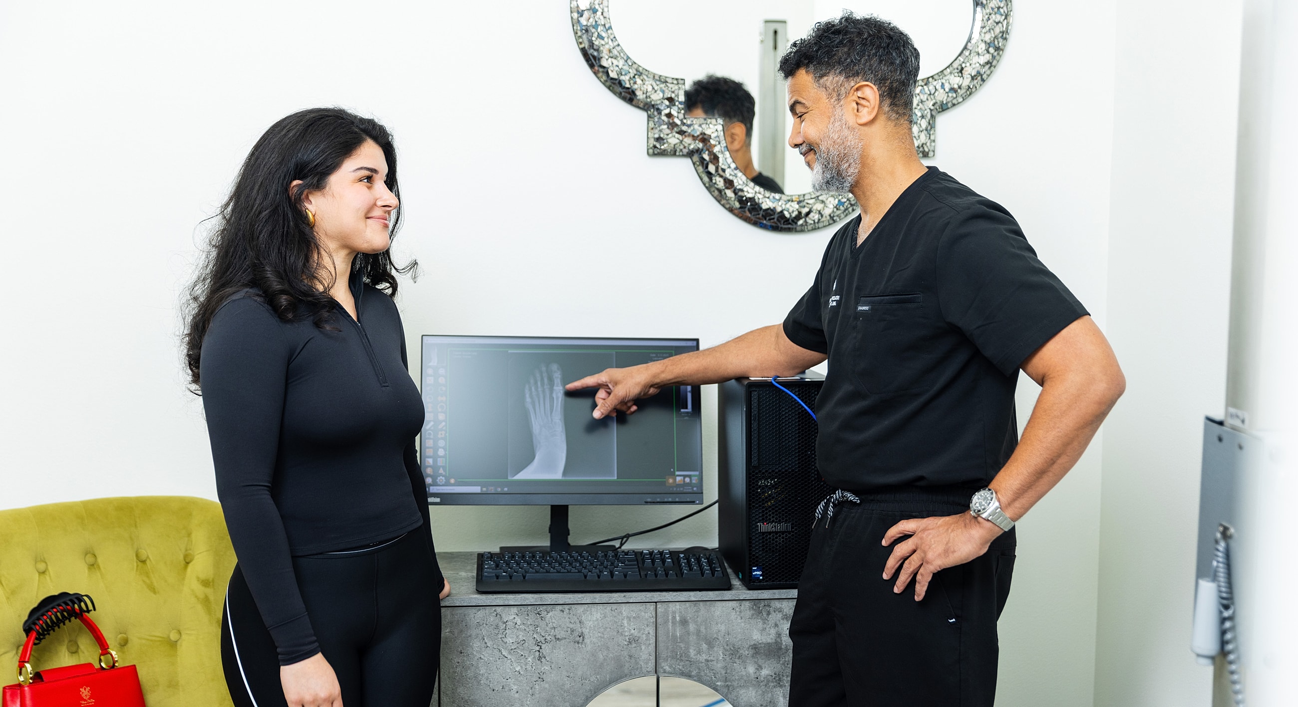 Consultation about an X-ray image in clinic.