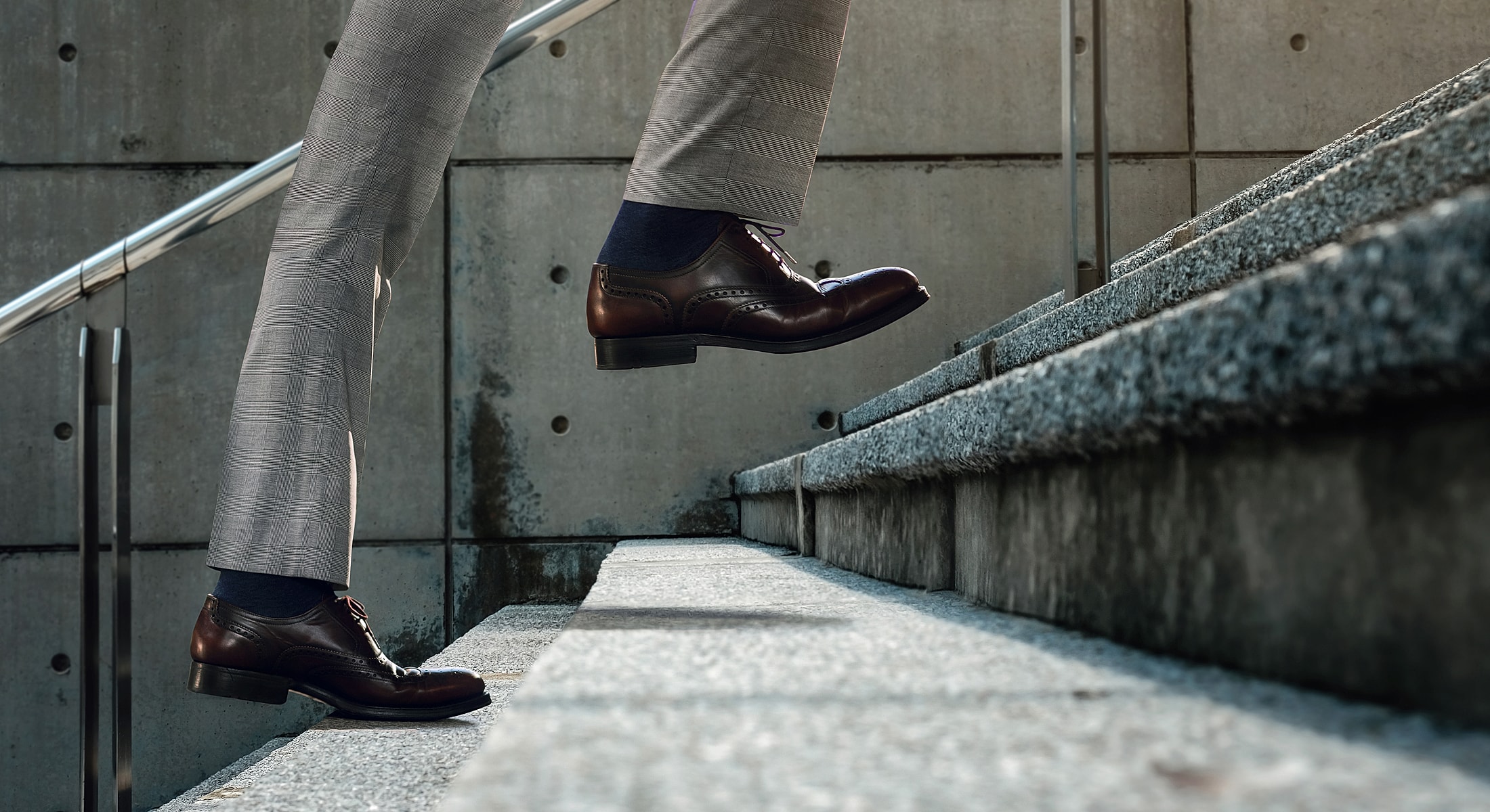 Woman walking barefoot on a wooden floor.